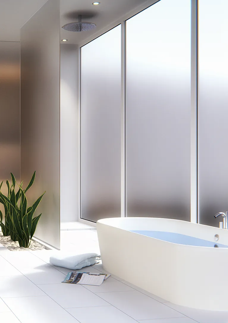 Fasara frosted decorative films add privacy to a wall inside a bathroom facing a bathtub and a far wall covering a shower.